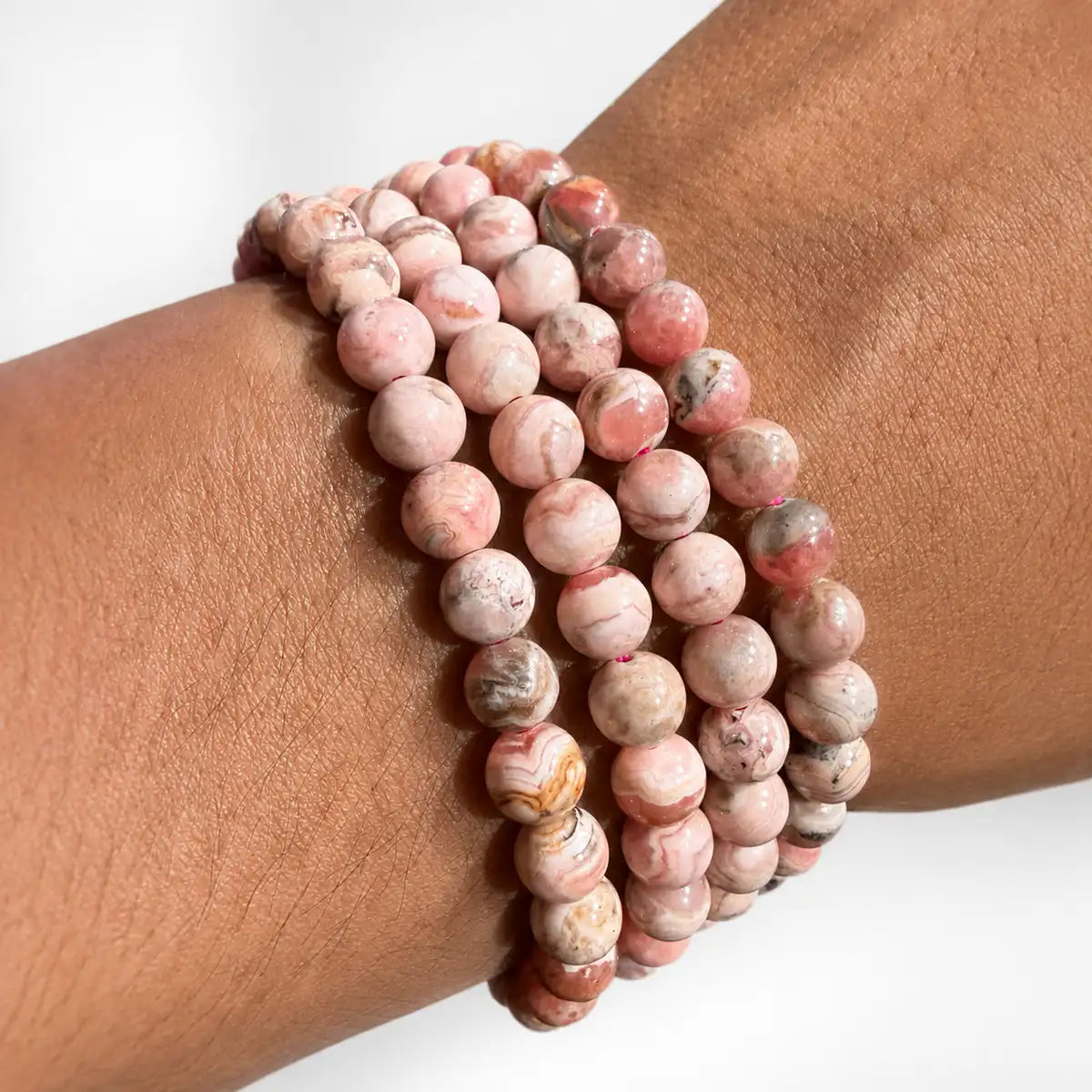 Pulsera rodocrosita 6mm – Amor y sanación