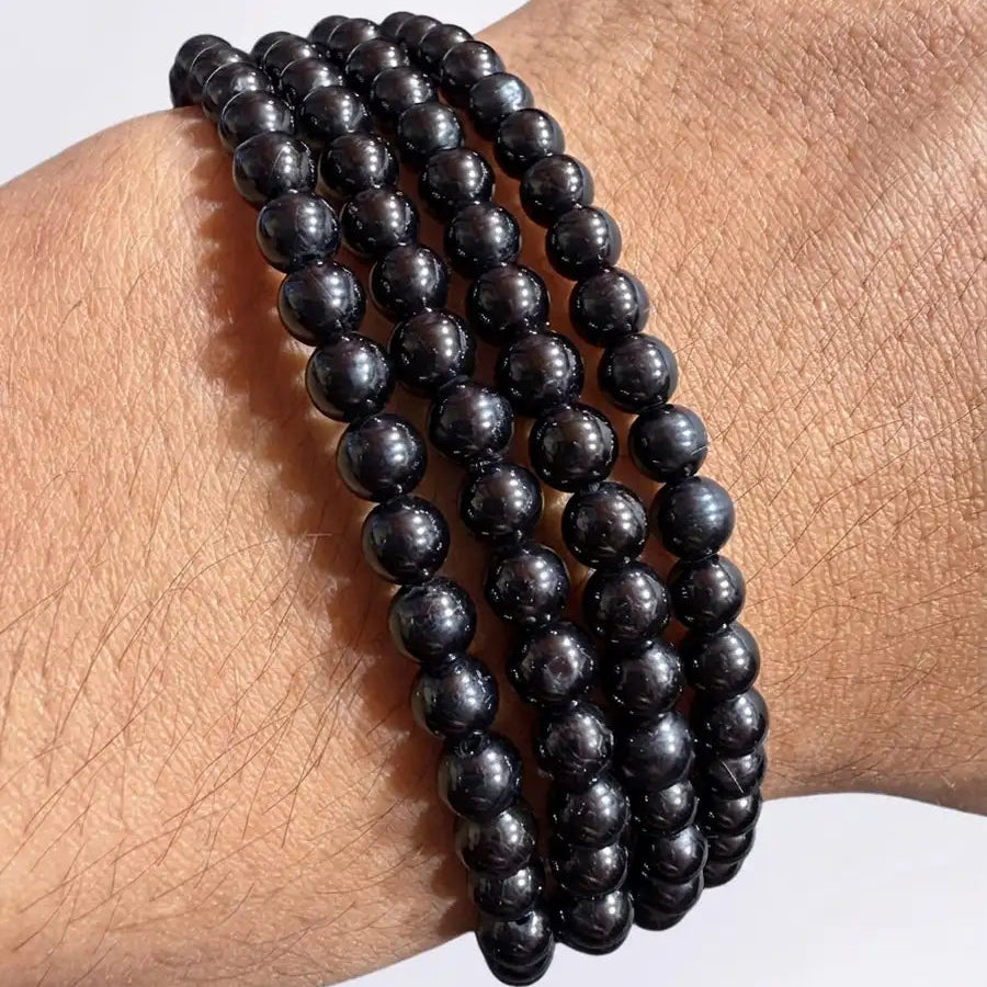 Pulsera turmalina negra 4mm – Protección y anclaje