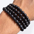 Pulsera turmalina negra 6mm – Protección y anclaje