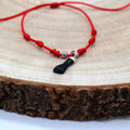 Pulsera roja puño de azabache 7 nudos - Protección