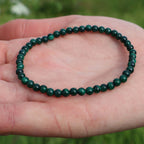 Pulsera malaquita 4mm – Transformación y protección